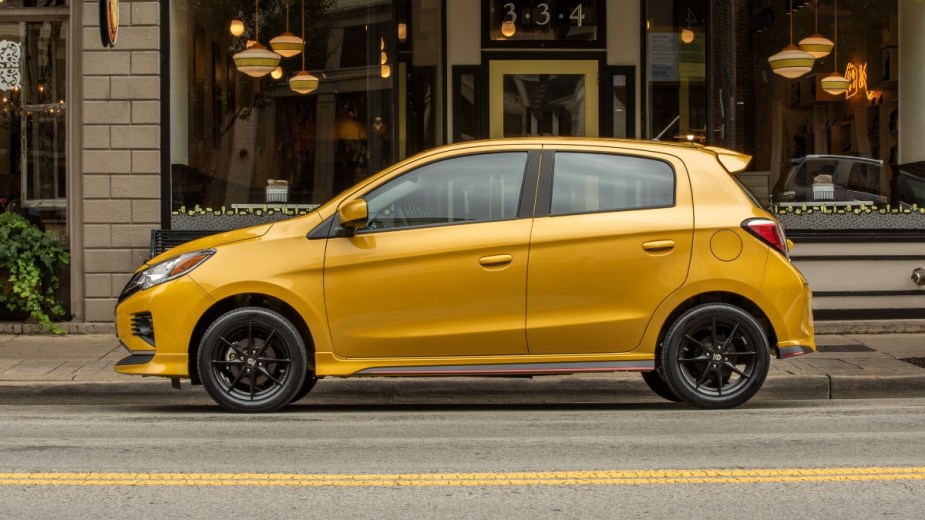 Side view of yellow 2022 Mitsubishi Mirage, the best non-hybrid gas-powered car to save money on gas