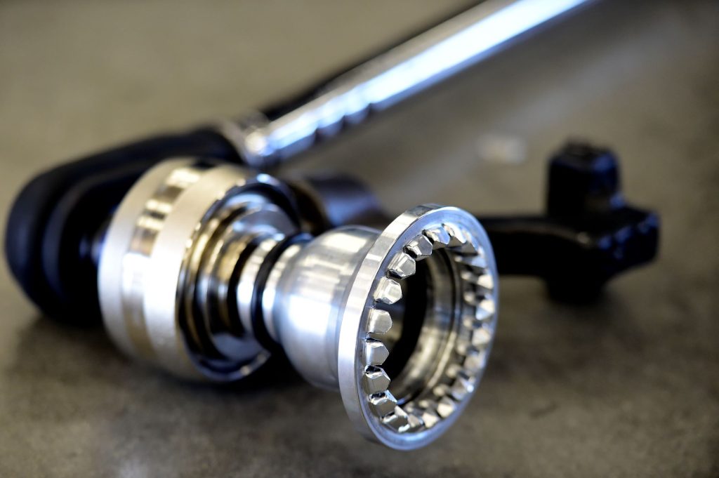 A close up view of a torque wrench, similar to a digital torque wrench. 