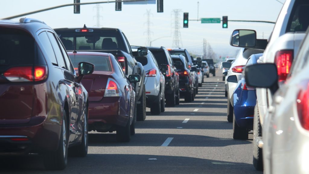 Traffic jam on a highway, highlighting study that shows car noises cars heart attacks and strokes