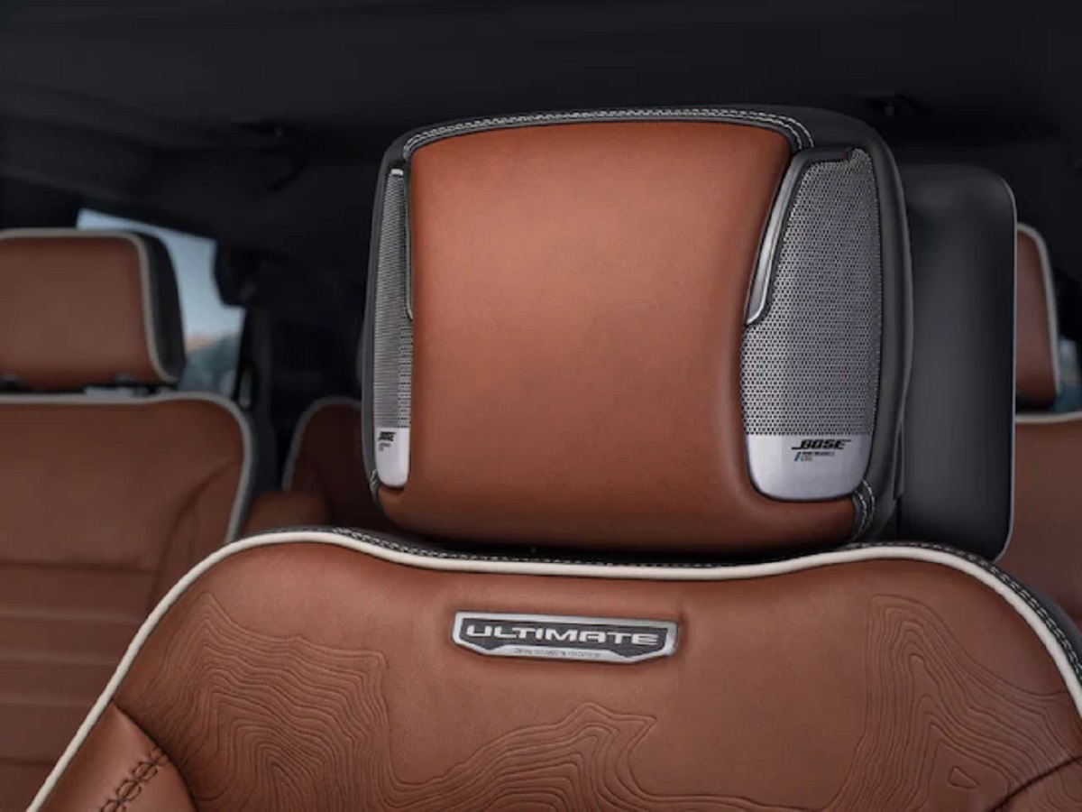A brown leather headrest of the 2023 GMC Yukon Denali Ultimate.
