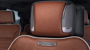 A brown leather headrest of the 2023 GMC Yukon Denali Ultimate.