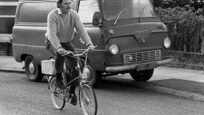 black and white photo of a vintage ford van