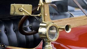 A 1912 Clement-Bayard car with a vintage car horn seen in Gloucestershire, United Kingdom