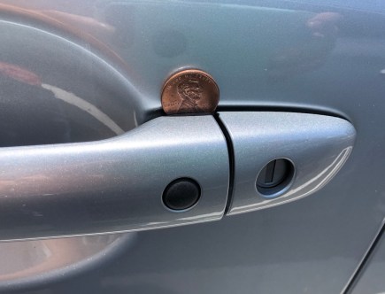 What Does a Coin in a Car Door Handle Mean?