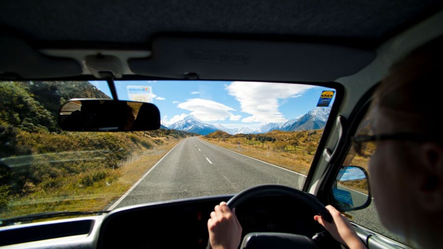 A man driving an RV motorhome to Aoraki Mount Cook in New Zealand