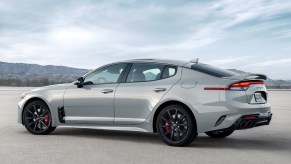Silver Kia Stinger, one of the last affordable cars with a V6 engine