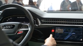 An Audi infotainment system with Google Maps on display.