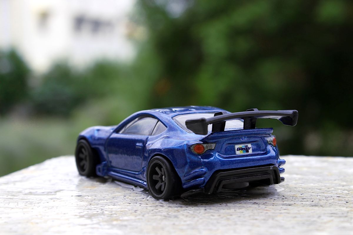 Unbranded small model of a blue Subaru BRZ Rocket Bunny 