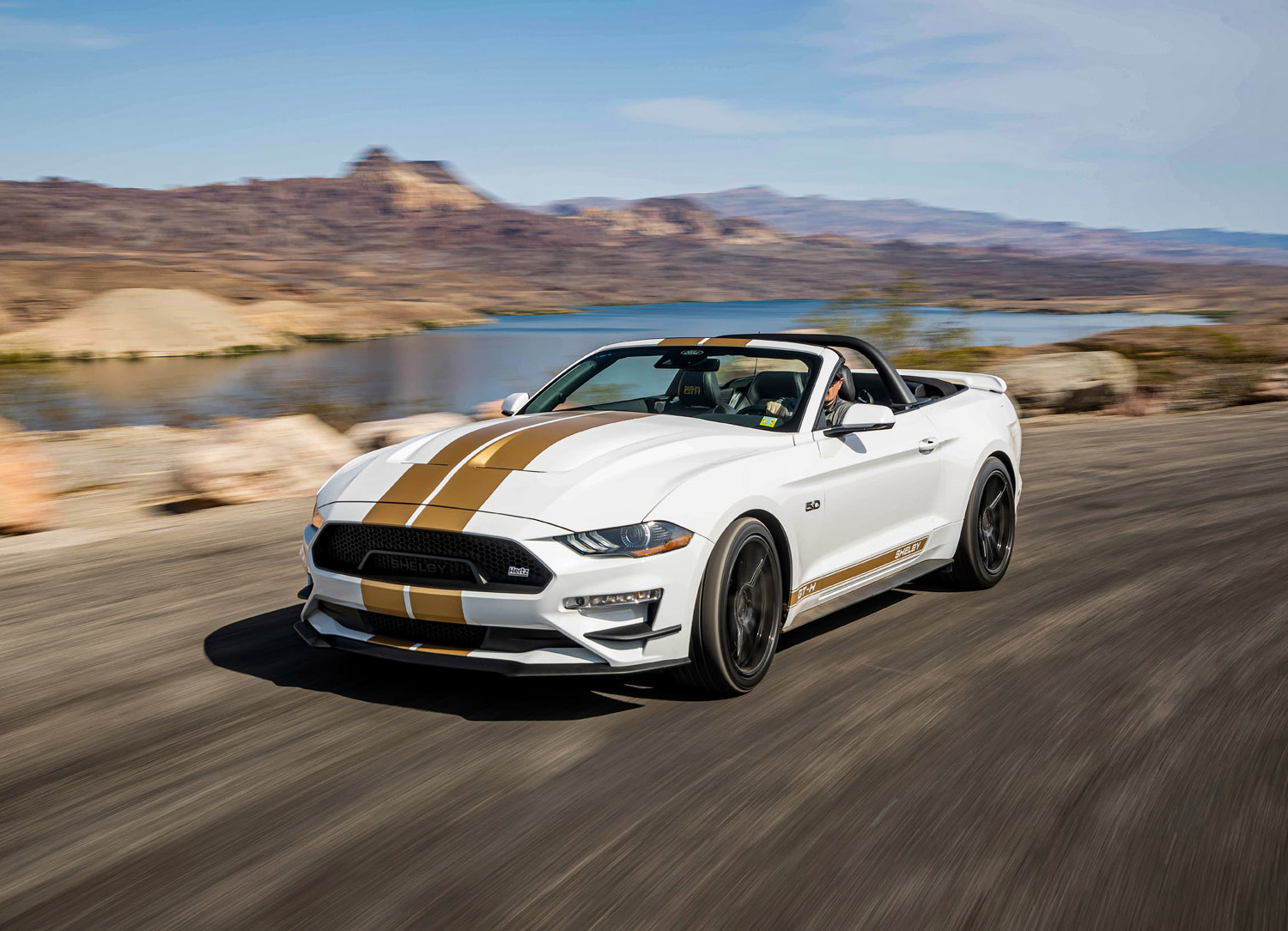 White Shelby GT-H Convertible Hertz Rent A Racer driving down Nevada highway