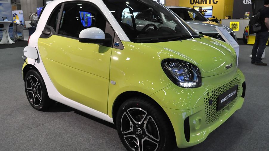 Neon green Smart EQ For Two, one of the most affordable used electric cars