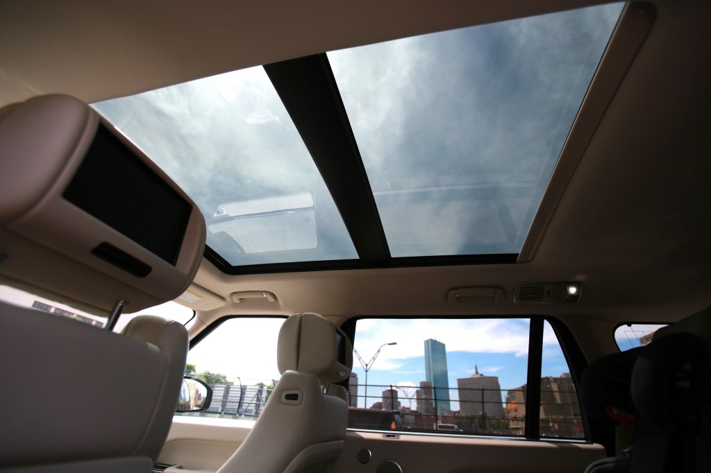 sunroof and moonroof shot from inside of a car