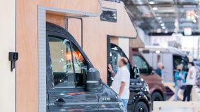 A collection of wooden RV camper motorhomes at the 60th Caravan Salon at Messe Dusseldorf