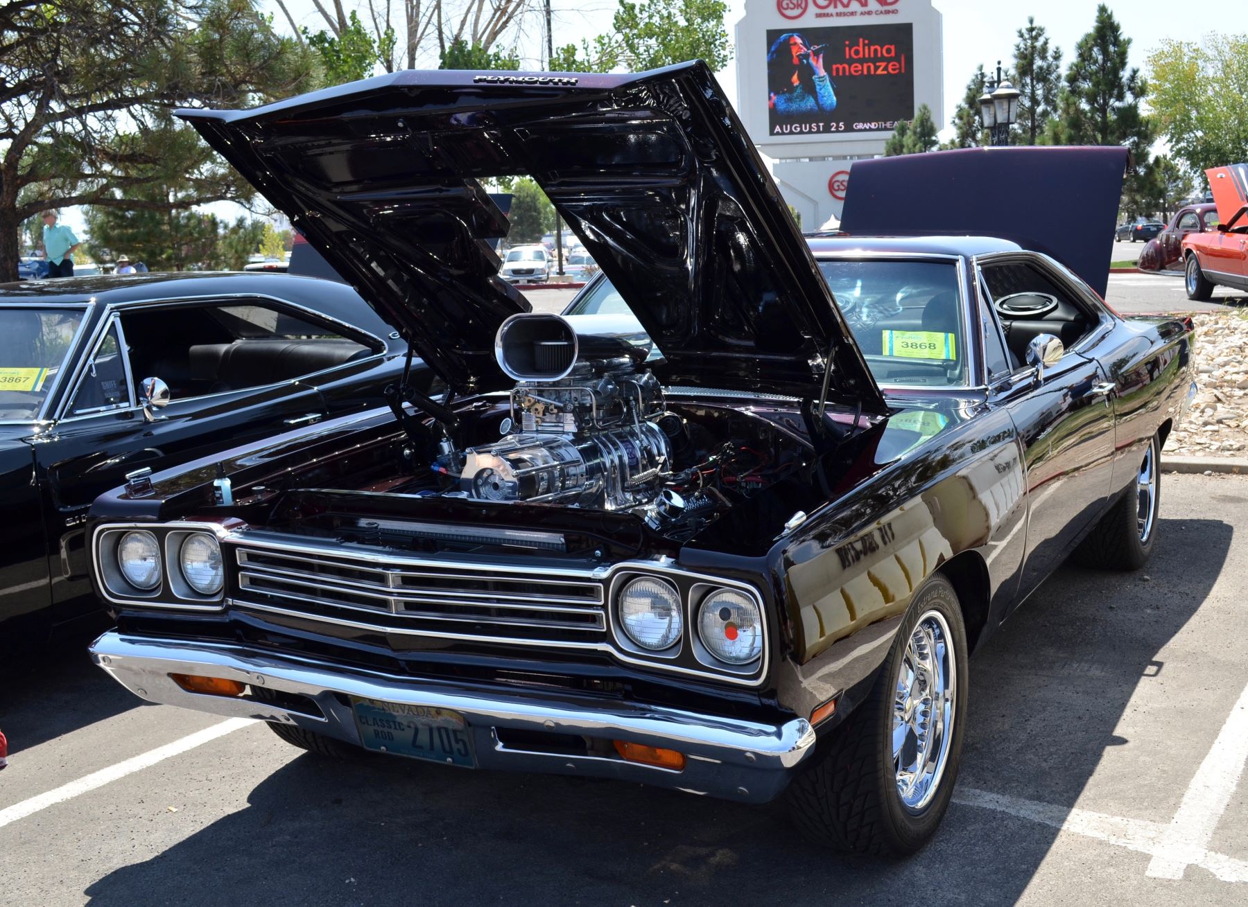 A 1969 Plymouth Road Runner with a V8 engine on display at Hot August Nights Custom Car Show in Reno, Nevada