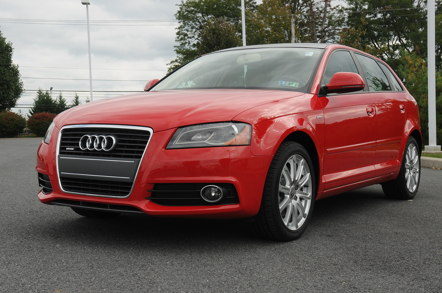 Front 3/4 of Red Audi A3 Luxury hatchback from 2009