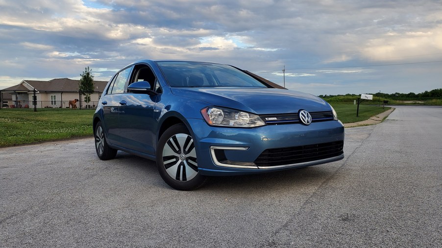 Blue 2016 Volkswagen e-golf electric vehicle EV parked in front of evening sun in Missouri