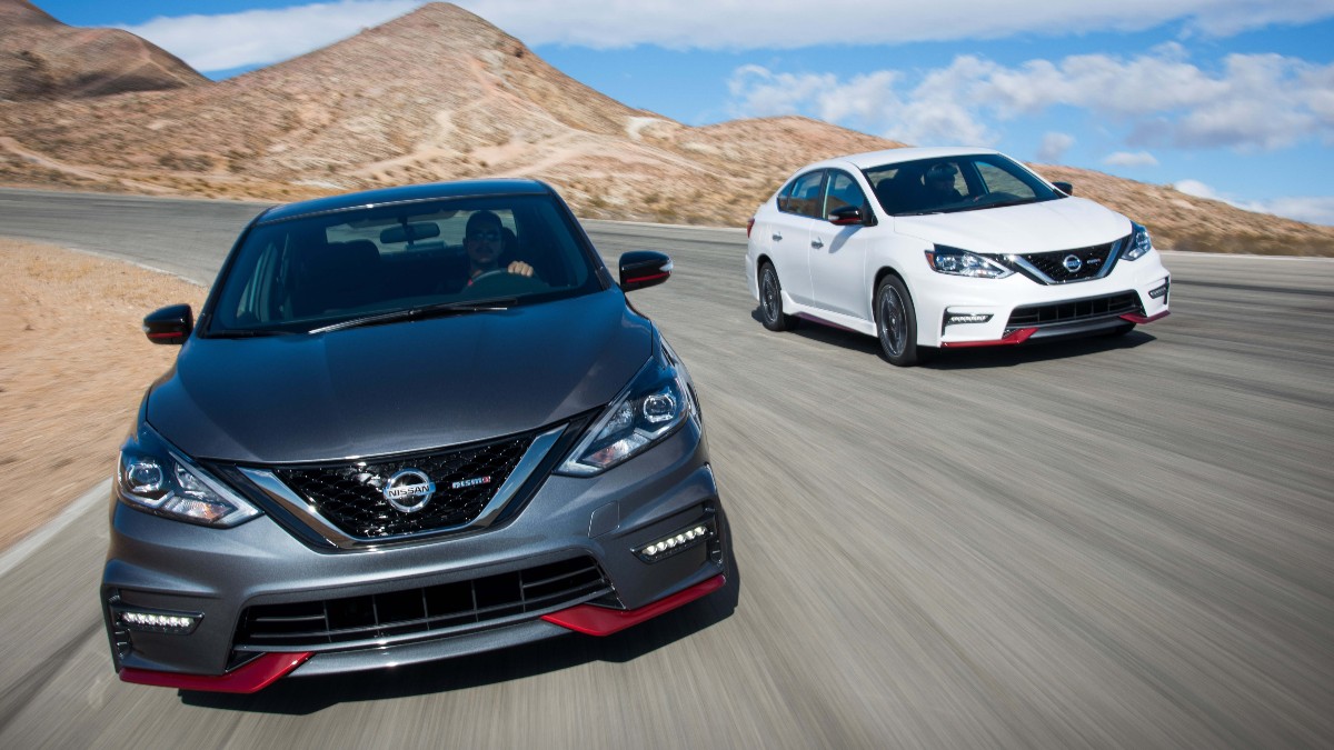 a gray and white 2017 nissan sentra nismo models, a fast performance focused compact sedan