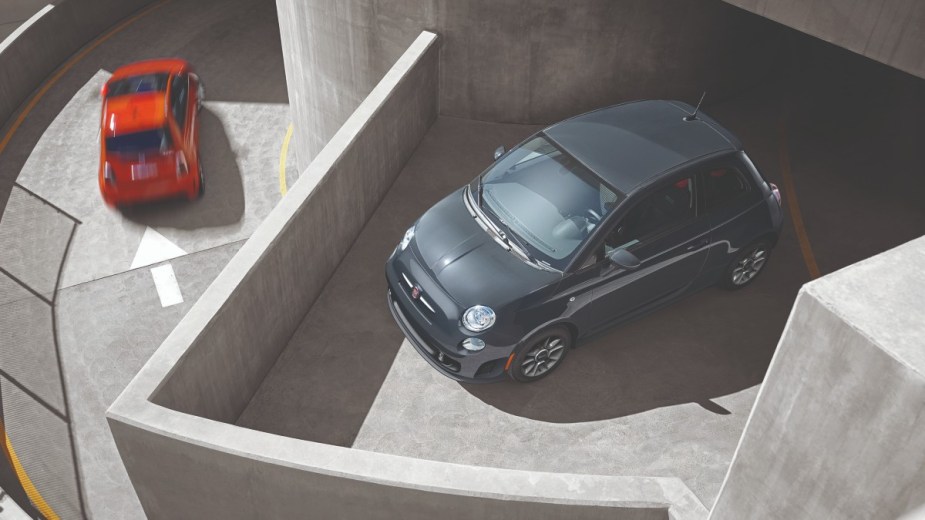 a 2019 fiat 500 parked on a garage overhand, a car that is not reliable