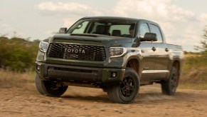 A gray 2020 Toyota Tundra kicking up dirt.