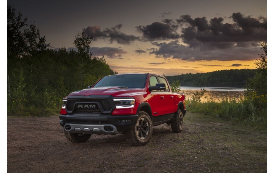 2021 Ram Rebel in red by a lake. Does anyone regret buying it?