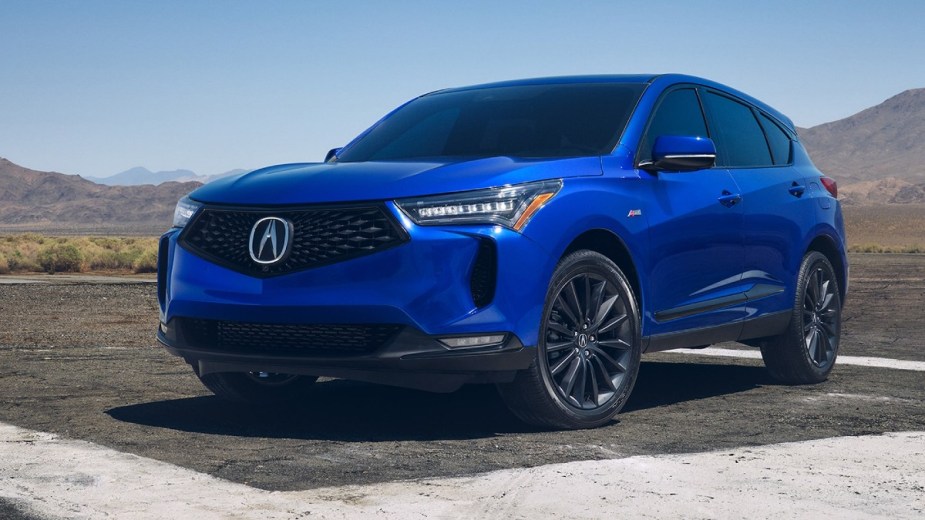 A blue 2022 Acura RDX. Consumer Reports recommends every Acura luxury SUV. 