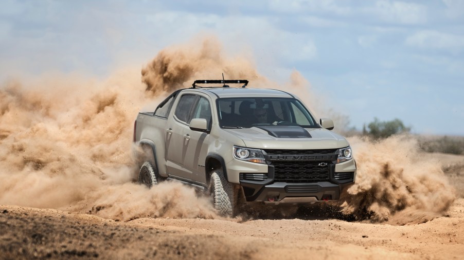 A Chevrolet Colorado, one of the overland vehicles, driving through a desert