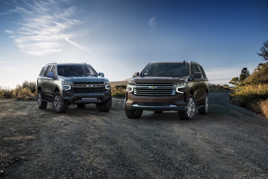 Advertising photo of the 2022 Chevrolet Tahoe Z71 and Suburban High Country parked on a mountaintop.