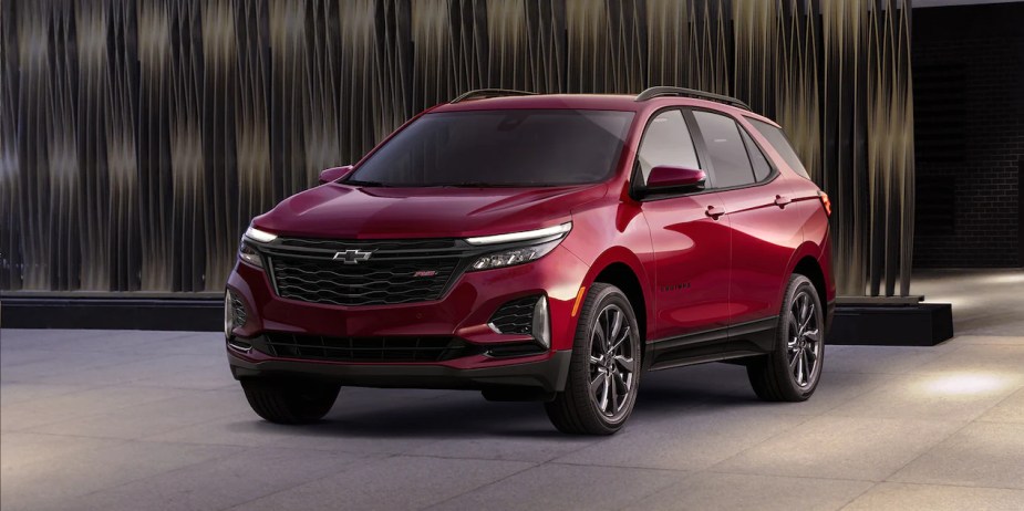 A red 2022 Chevy Equinox, should you buy a LS or LT trim level of the SUV?