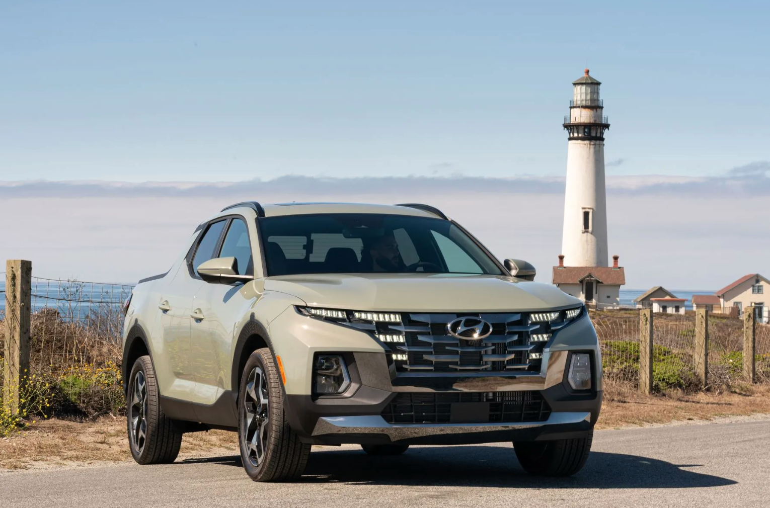 2022 Hyundai Santa Cruz parked in front of a lighthouse