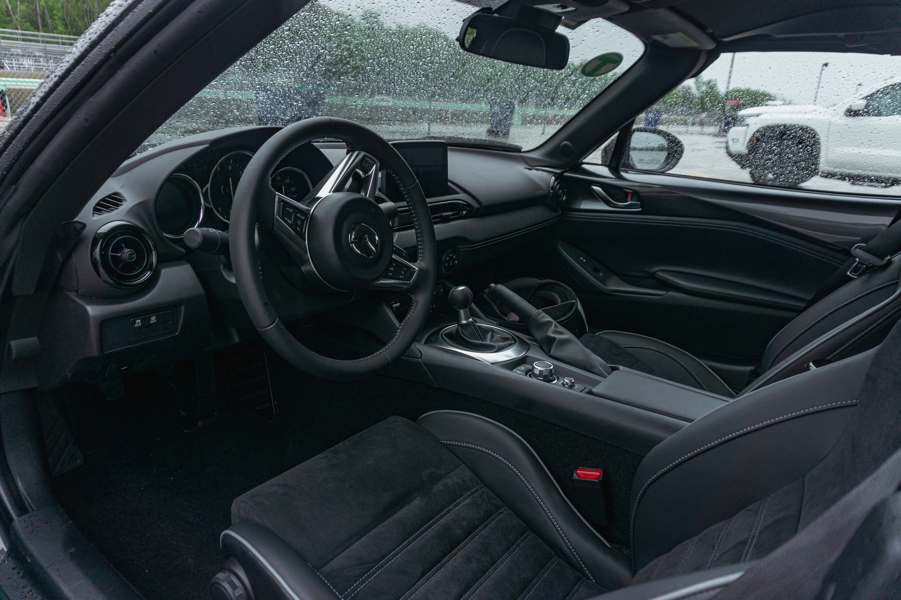 The black-cloth interior of a 2022 Mazda MX-5 Miata RF Club