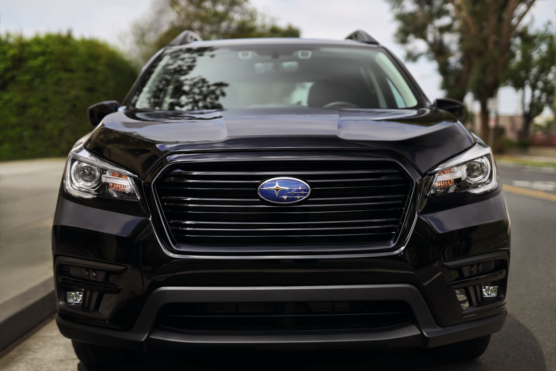 The 2022 Subaru Ascent Onyx Edition midsize SUV model grille, badging, and headlights
