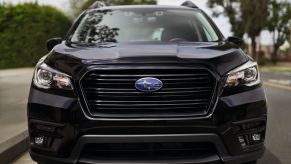 The 2022 Subaru Ascent Onyx Edition midsize SUV model grille, badging, and headlights