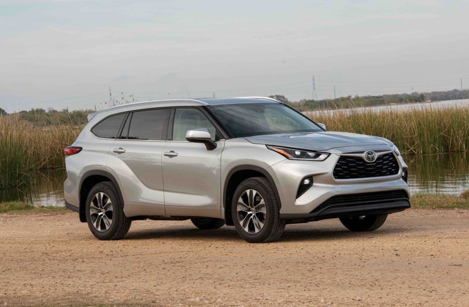 A silver gray 2022 Toyota Highlander. The new TX will be built on a lengthened version of this popular Toyota. 