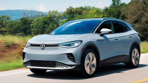 A 2022 Volkswagen ID.4 electric SUV is driving.