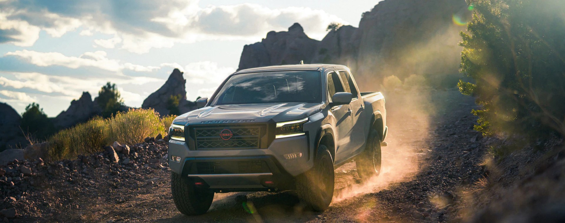 A 2022 Nissan Frontier shows off its off-road prowess as a mid-size truck
