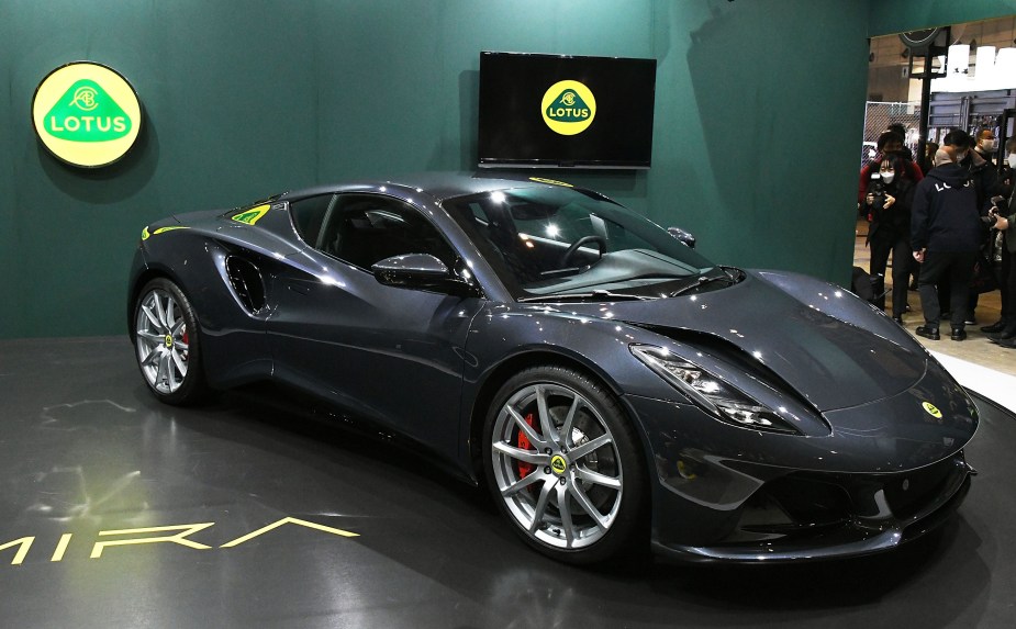 A gray 2023 Lotus Emira First Edition on stage at Tokyo Auto Salon 2022