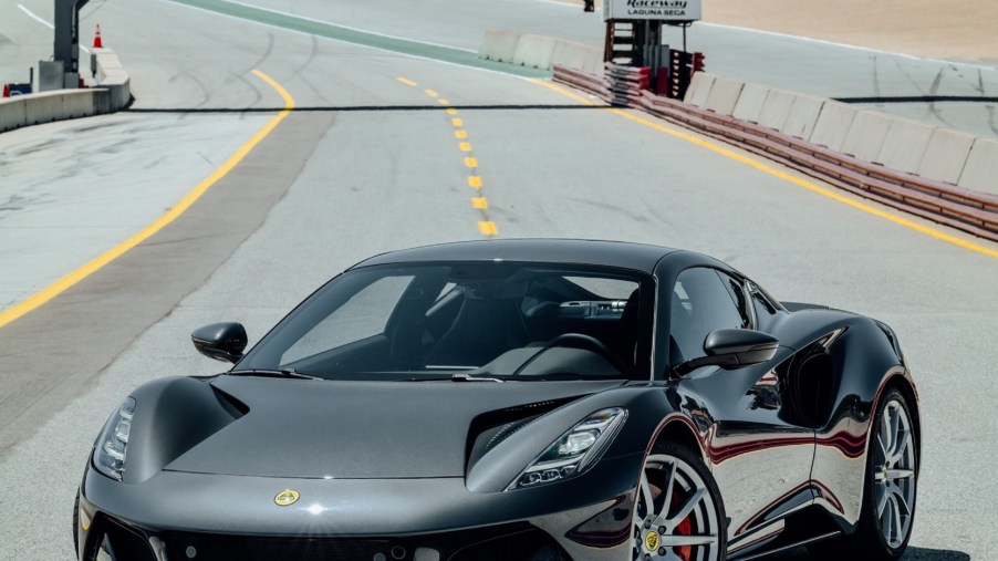 A gray 2023 Lotus Emira on the track at Monterey Car Week 2021