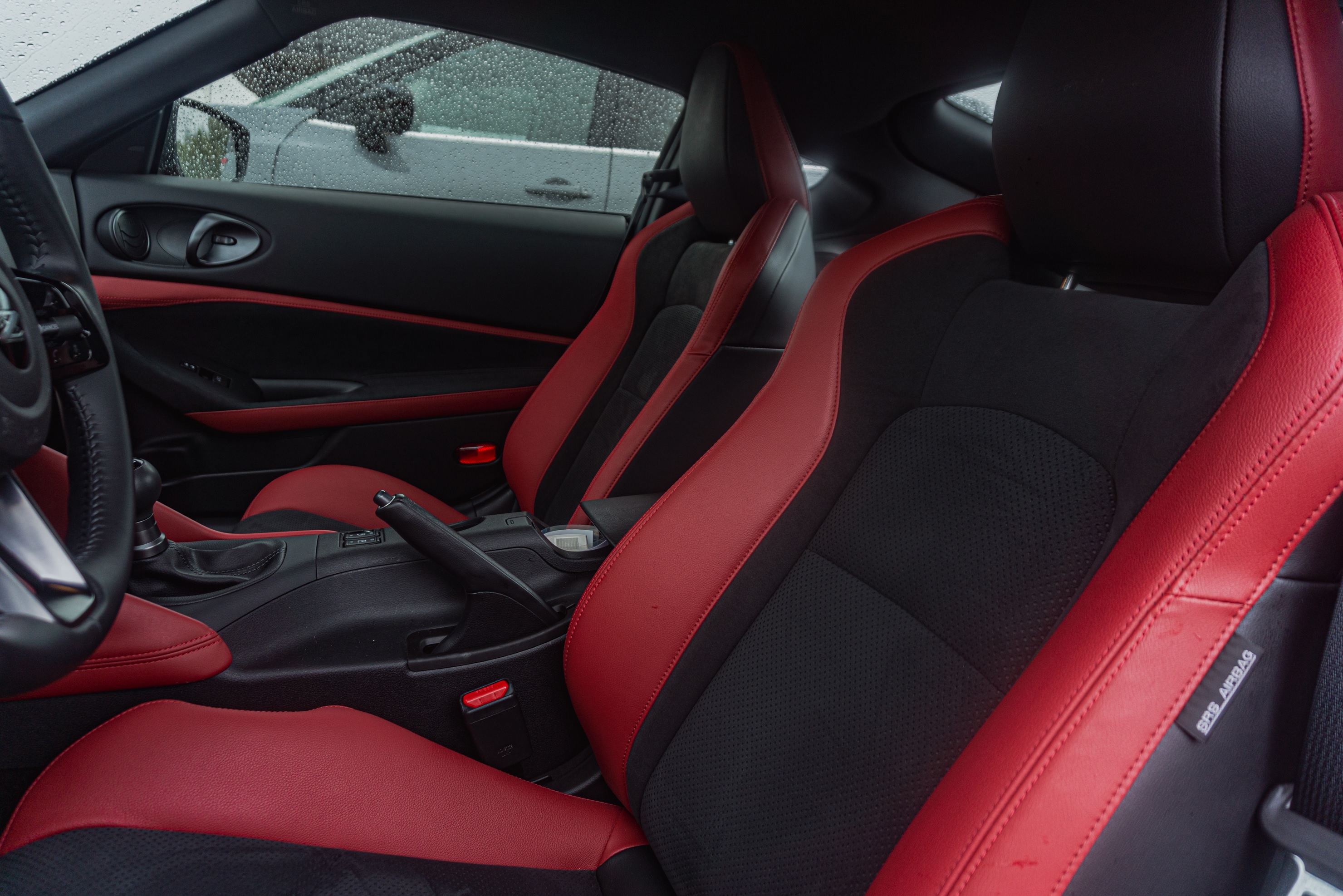 The black-and-red leather seats in a 2023 Nissan Z Performance
