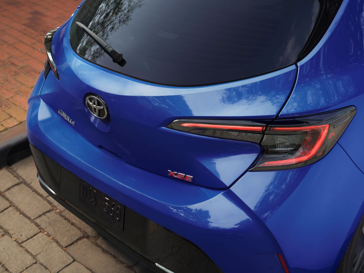 Close up shot of the rear of a blue 2023 Toyota Corolla Hatchback XSE compact car