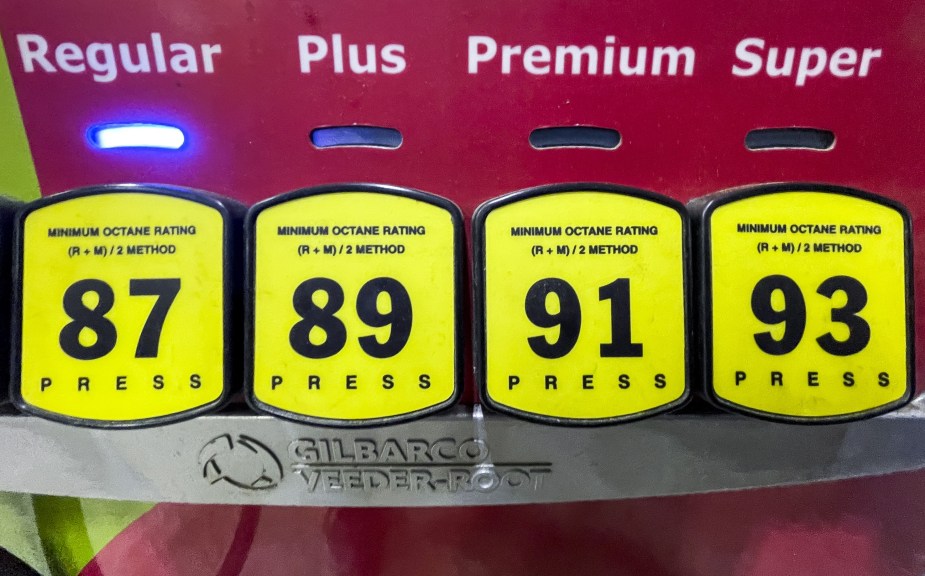 A gas station pump with four different fuel grades: regular, mid-grade, premium, and super. Choosing the right octane can save money on gas