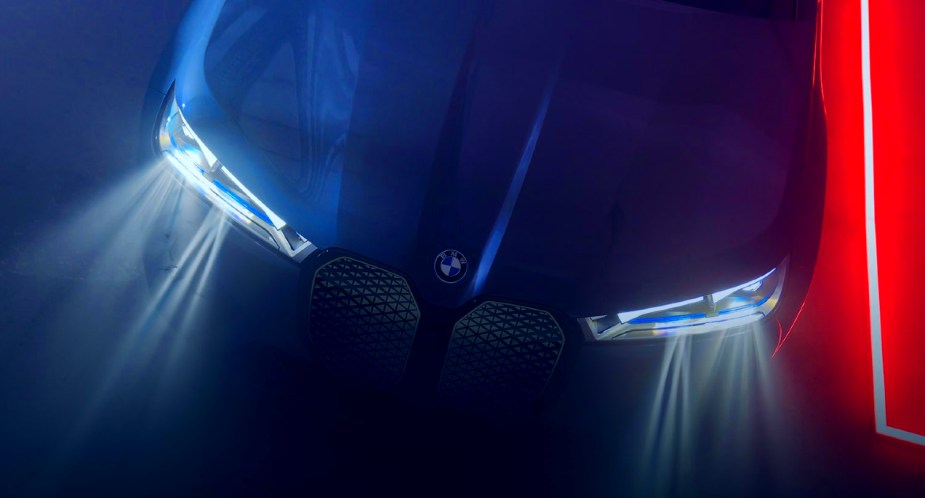 The front of a blue 2022 BMW iX electric SUV. 