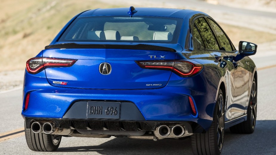 the rear end of a new acura tlx, a sporty luxury midsize sedan
