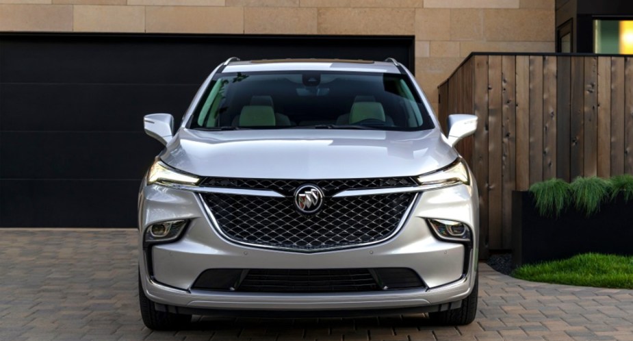 A 2022 Buick Enclave parked in a driveway, it's the only luxury large SUV under $50,000. 