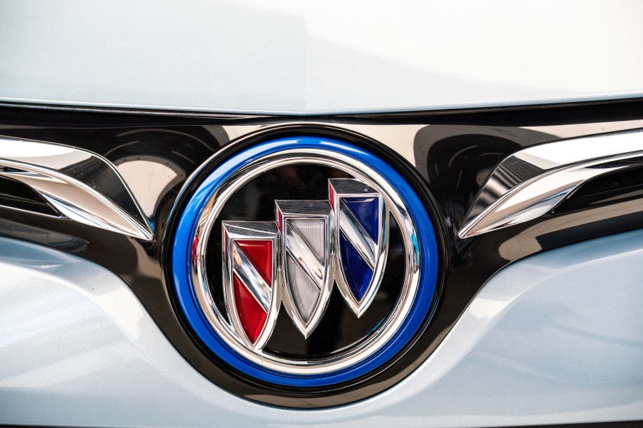 A Buick logo on a white car. 