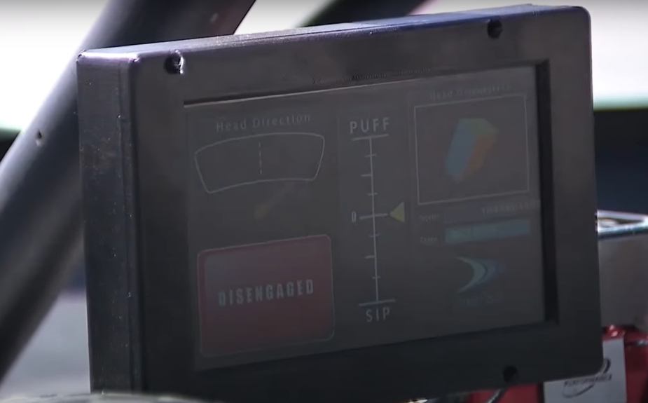 Computer system that enables a paralyzed man to drive a racecar with a brain microchip