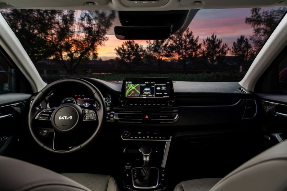 Dashboard and front seats of the 2023 Kia Seltos, highlighting its release date and price