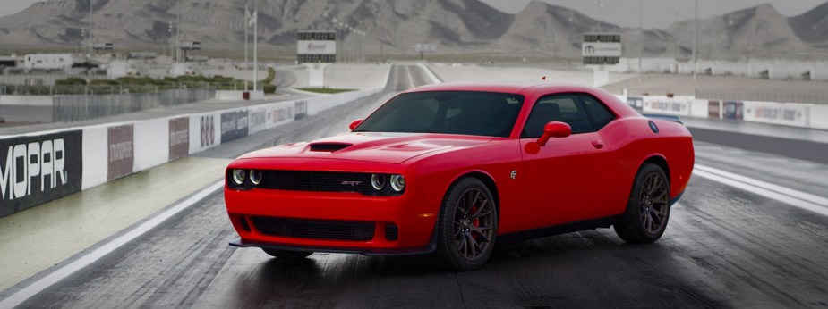 A Dodge Challenger Hellcat, here in red, is faster than a Demon in one way.