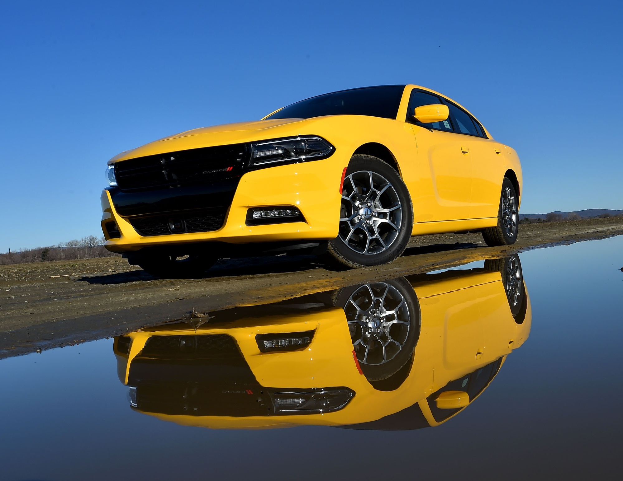 The Dodge Charger, pictured here in yellow, shares architecture with a Mercedes-Benz E-Class