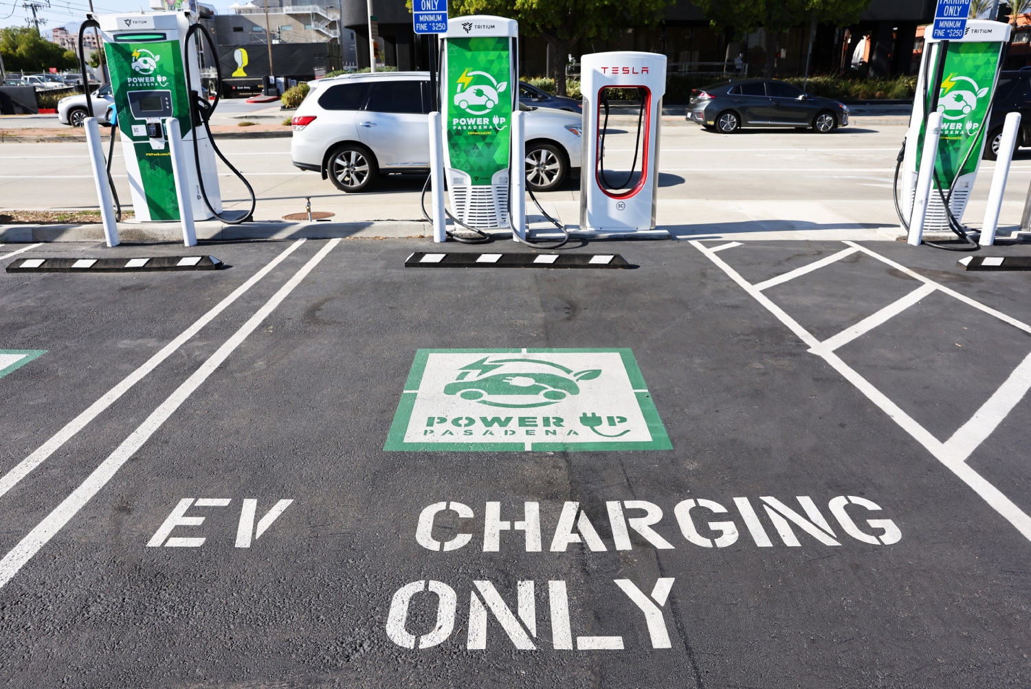 The national electric vehicle charging challenge as seen by GM, Ford and Tesla