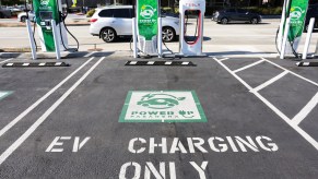 The national electric vehicle charging challenge as seen by GM, Ford and Tesla