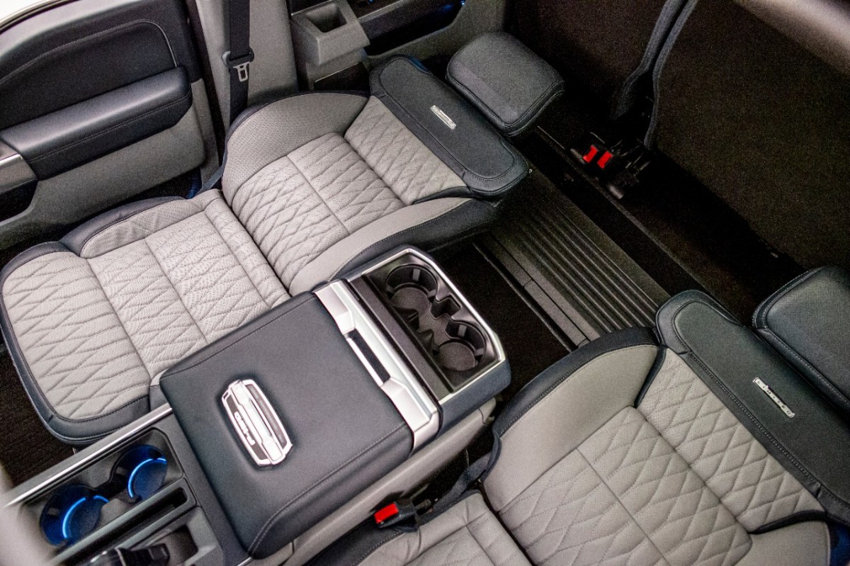 The 2022 Ford F-150 Lariat has Max Recline seats that fold flat. 